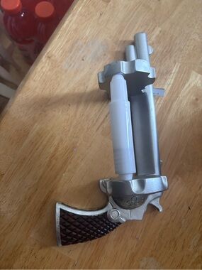 Silver and Brown Revolver-Style Novelty Accessory -toilet paper holder
